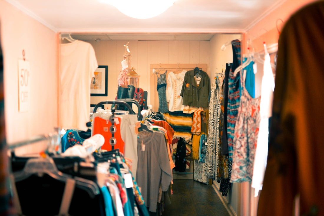 assorted-colored apparel in wardrobe