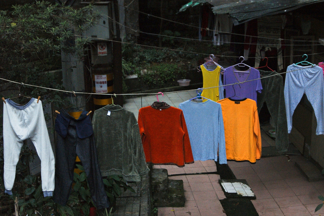 a line of clothes hanging on a clothes line
